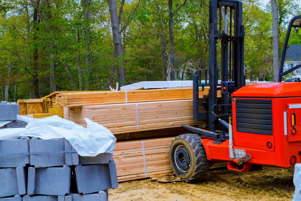 residential forklift moving construction materials 