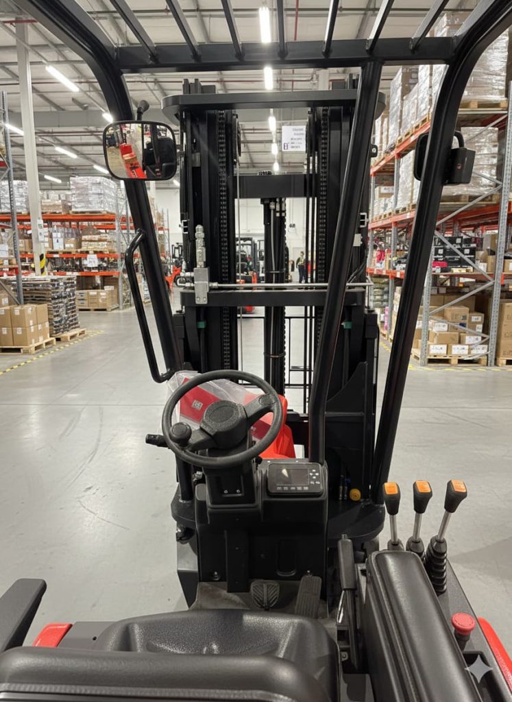 Photo from inside cab of articulated forklift